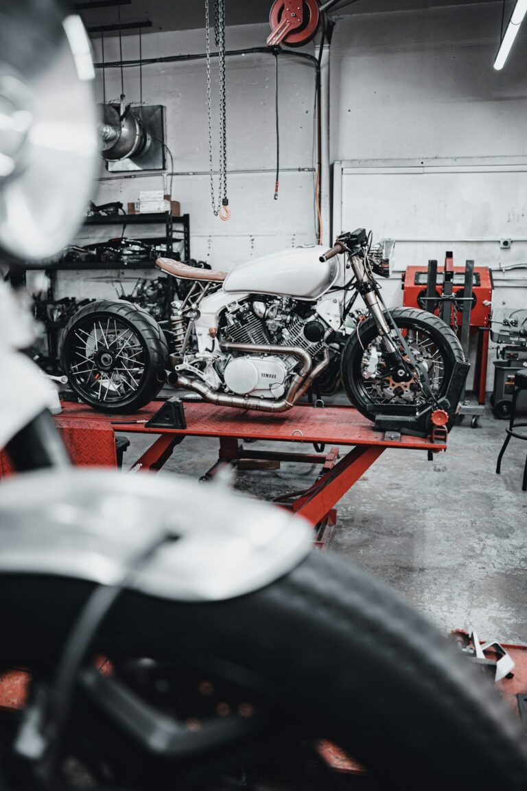 Motorcycle parked in a service garage after work